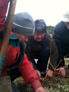 Fay planting tree FHT 2012 photo Findhorn Hinterland Trust