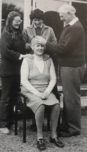 Bruce MacManaway treating a patient with the help of a small group photo Janet Banks