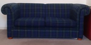Healthworks much loved tartan sofa in the waiting room
