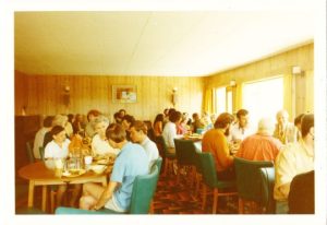 1971 Meal in the Community Centre Eileen and the boys (left), Peter (right) photo Findhorn Community bought by Marilyn Barry during a visit