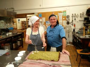 Cooking in Cluny kitchen - Beatrix and Stewart photo Cornelia Featherstone