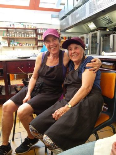 Cooking in Cluny kitchen - Cally and Sharon photo Cornelia Featherstone