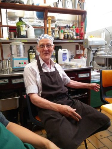 Cooking in Cluny kitchen - Klaas photo Cornelia Featherstone