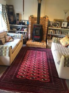 Living Room with amazing wood stove photo Manda Stretch